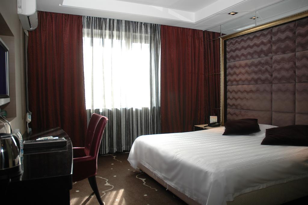 Harbin Yakelai Holiday Hotel Pokoj fotografie