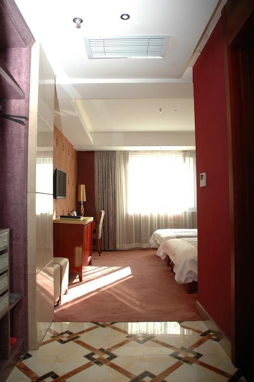Harbin Yakelai Holiday Hotel Pokoj fotografie