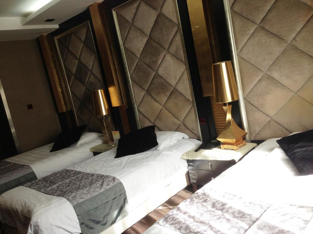 Harbin Yakelai Holiday Hotel Pokoj fotografie